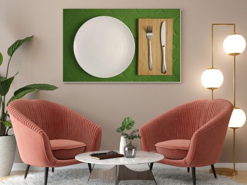 Modern Cutlery set on green fabric background