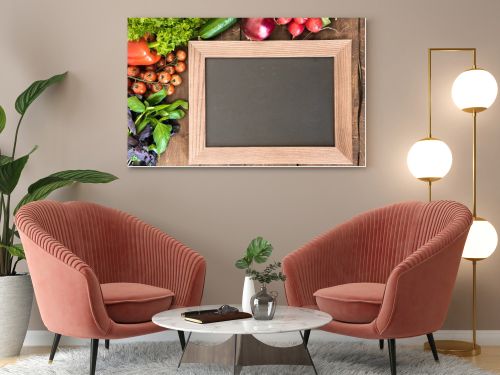 chalkboard with group of fresh vegetables 