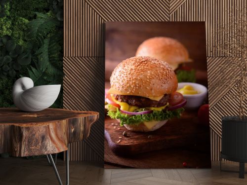 Fresh burger closeup. Wooden rustic background. Top view