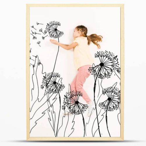 top view of kid blowing dandelion seeds while flying on white 