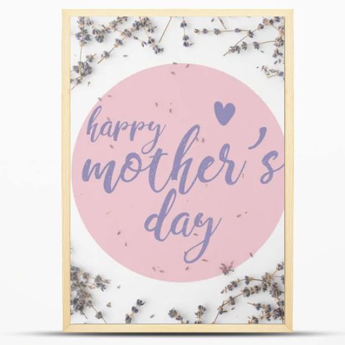 top view of mothers day greeting with frame of lavender flowers on white tabletop