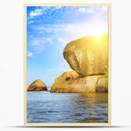 A picturesque cliff on the shore of a tropical sea.