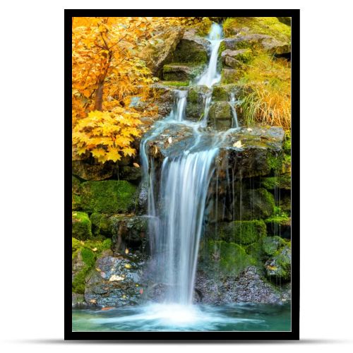 Landscape of Waterfall in yellow Autumn forest