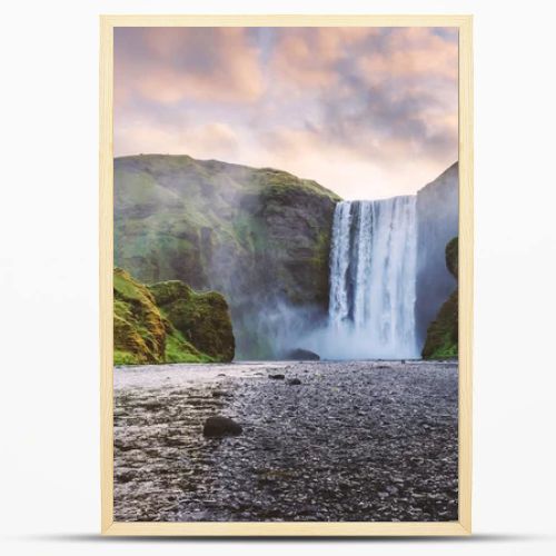 Famous Skogafoss waterfall on Skoga river in sunrise time