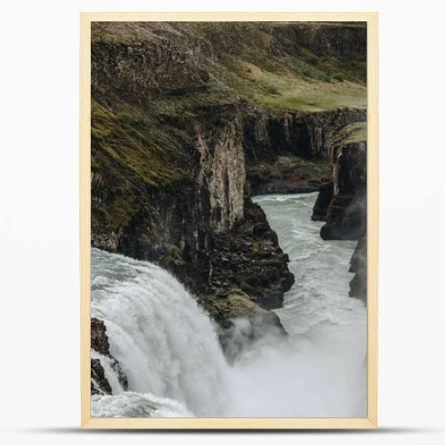 aerial view of beautiful Gullfoss waterfall flowing through highlands in Iceland