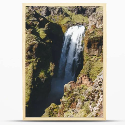 aerial view of landscape with Skoga river and mountain under bright blue sky in Iceland 