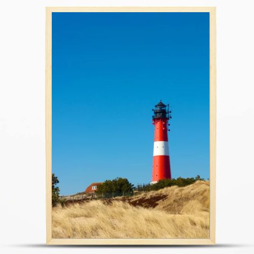 Lighthouse between dunes 3