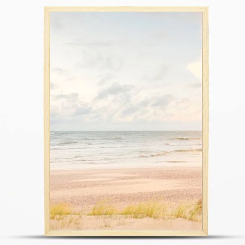 Baltic sea coast (sand dunes) after the storm at sunset. Clear sky, glowing clouds, wind. Autumn landscape. Nature, environmental conservation, ecology, ecotourism, local travel