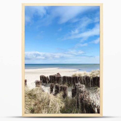 Baltic sea dunes over blue coastline background in Northern Germany