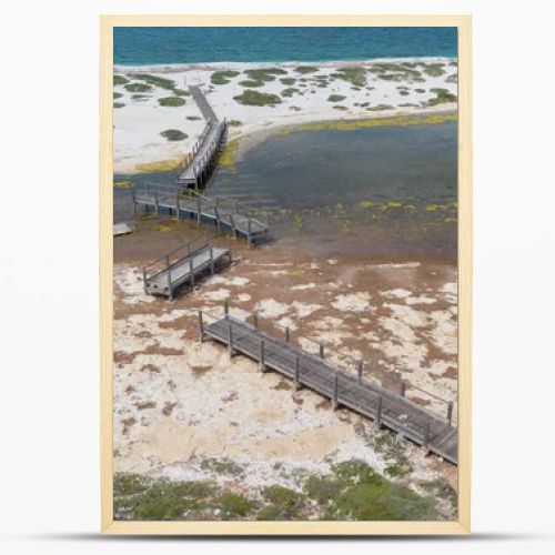 Coastal Wetland Landscape With Wooden Walkway And Sand Dunes in Mari Ermi Cabras
