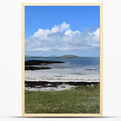 Beautiful sandy beach with coastal dunes on the remote island of South Uist in the Outer Hebrides of Scotland.