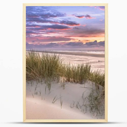 Sunset View from dune top over North Sea from the island of Ameland, Friesland, Netherlands