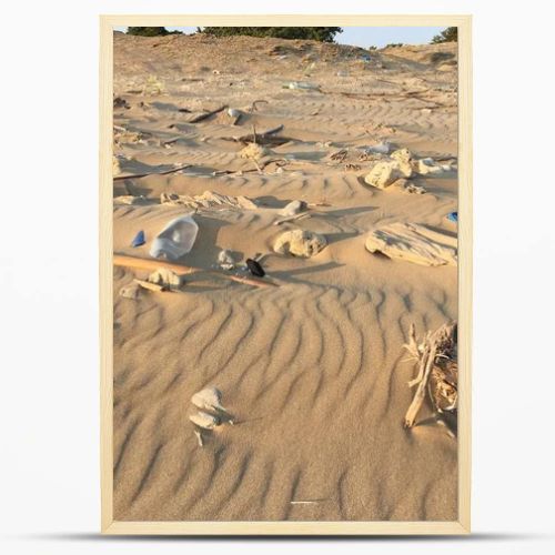 Garbage on sandy beach