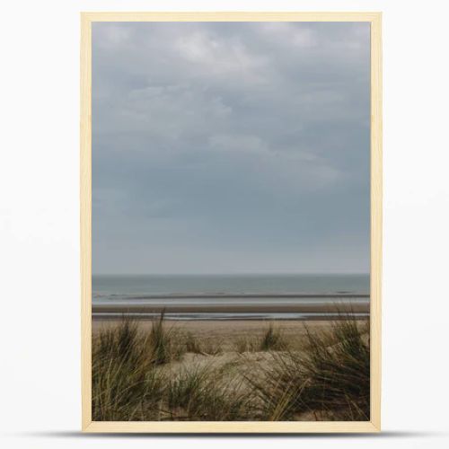 dramatic shot of sandy seashore on cloudy day, Bray Dunes, France