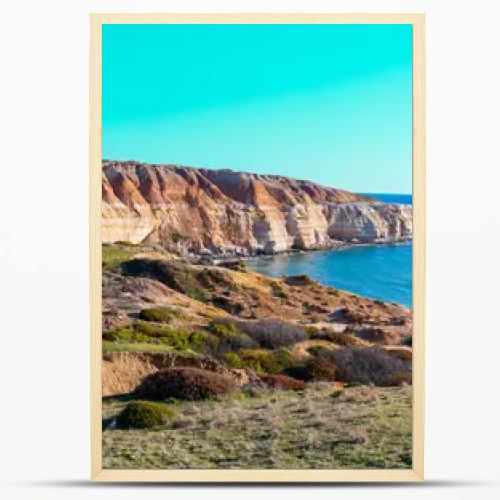Maslin Beach, located 42 km south of Adelaide on South Australias Fleurieu Peninsula, is renowned for its pristine white sands, clear turquoise waters, and dramatic ochre cliffs. As Australias first legal clothing-optional beach, established in