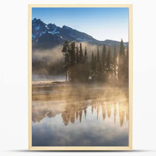 scenic view of landscape with sky reflecting in lake with trees in background