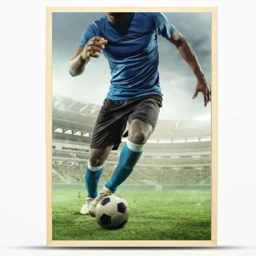 Cropped image of running soccer, football player at stadium during football match. Concept of sport, competition, goals