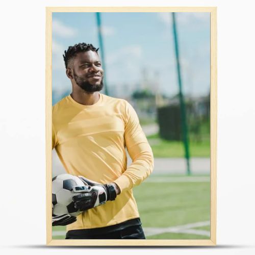 african american goalkeeper with ball