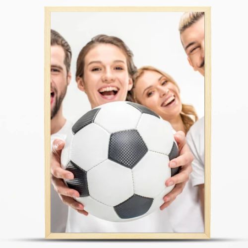 Cheerful friends with soccer ball