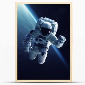 Astronaut at spacewalk. Cosmic art, science fiction wallpaper. Beauty of deep space. Billions of galaxies in the universe. Elements of this image furnished by NASA