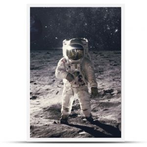 Astronaut on rock surface with space background. Elements of this image furnished by NASA