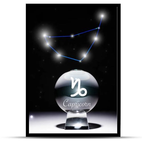 crystal ball with Capricorn zodiac sign isolated on black with constellation