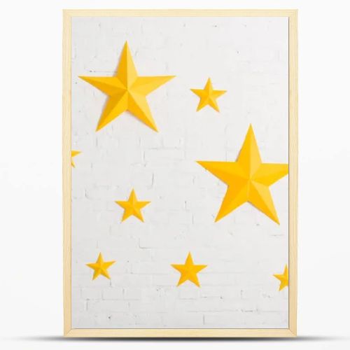 Yellow cardboard stars on light textured background