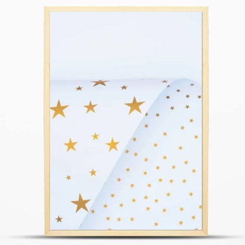 view from above of festive paper decorated by golden stars isolated on white 