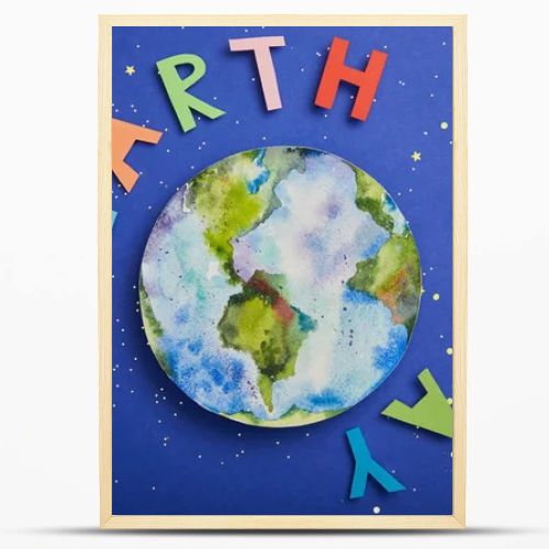 top view of colorful paper letters and planet picture on violet background with stars, earth day concept