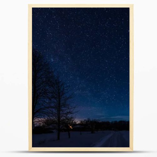 dark sky full of shiny stars in carpathian mountains in winter at night