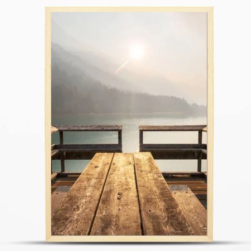 Wooden pier in serenity mountains lake