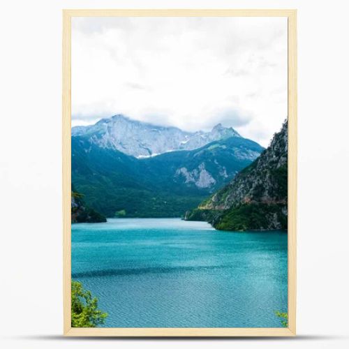 landscape of beautiful Piva Lake, mountains and clouds in Montenegro