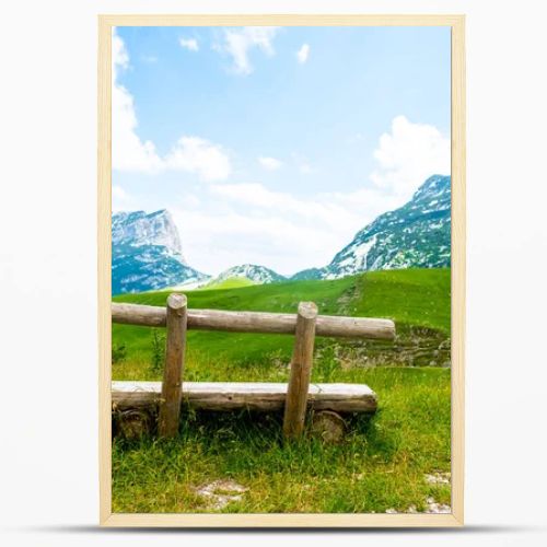 wooden bench with beautiful mountains in Durmitor massif, Montenegro