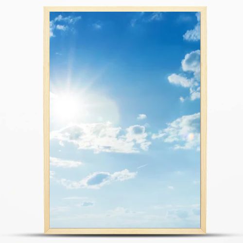 Blue sky with clouds and sun.