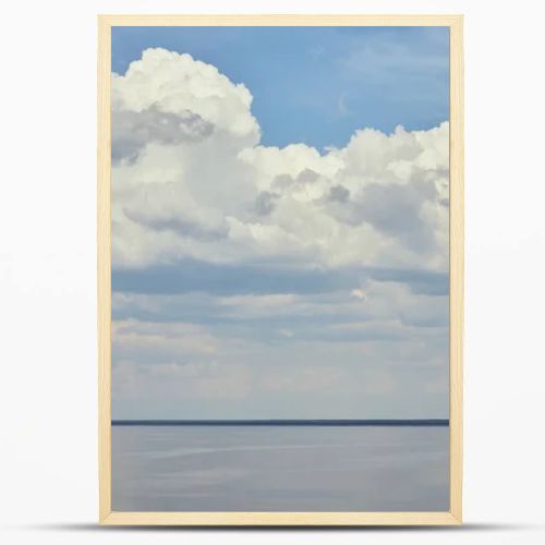 Landscape with river and white clouds on blue sky