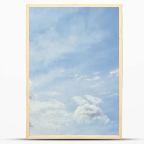 Light white clouds on peaceful blue sky with copy space