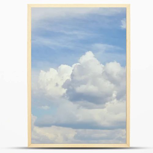 Peaceful cloudscape with white clouds on blue sky 