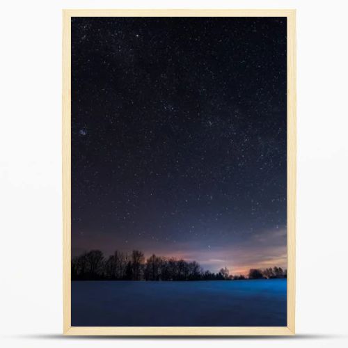 dark sky full of shiny stars in carpathian mountains in winter at night