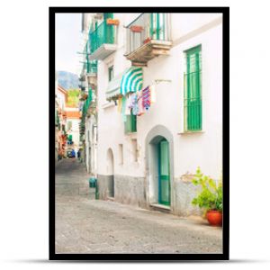 narrow european street with ceramic decorations