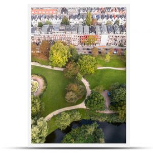 Aerial view of Amsterdam city roofs beside Sarphati park 