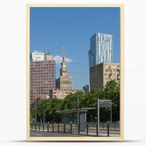 Warsaw cityscape - view of the street and skyscrapers in the center on a sunny day