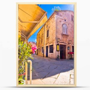 Sunny stone street of ancient Pula view