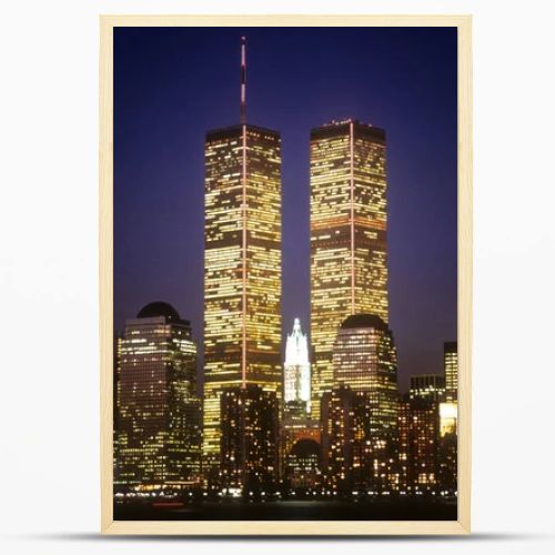 New York City skyline with the World Trade Center towers at night. Horizontal shot.