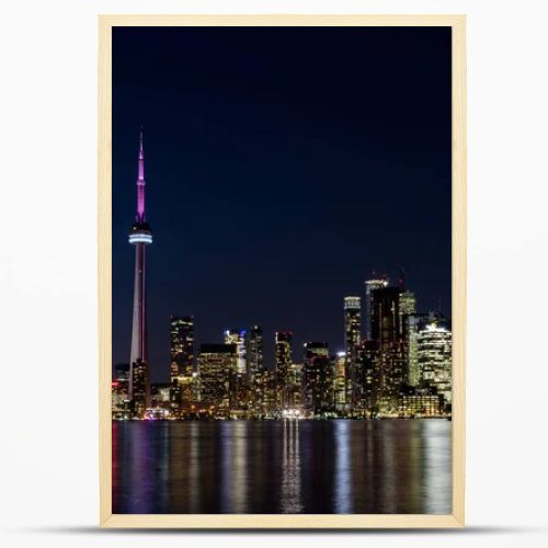 Night View of Downtown Toronto from Toronto Islands with the Lake Ontario, Canada.