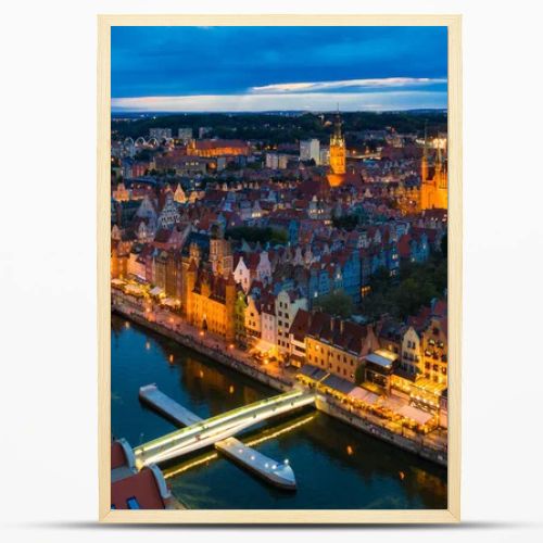 Aerial view of the Gdansk city over Motlawa river with amazing architecture at dusk,  Poland