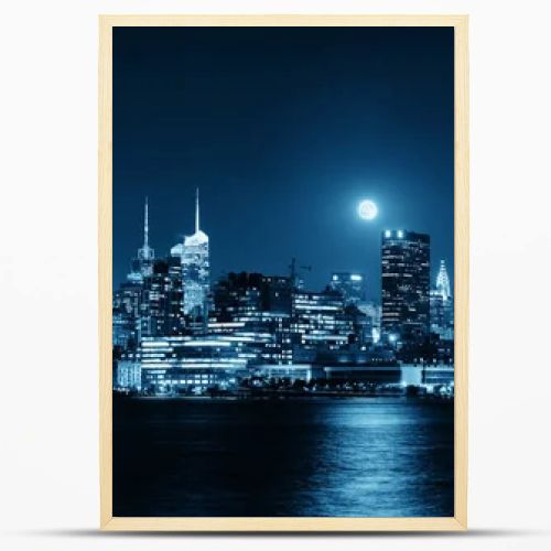 Moon rise over midtown Manhattan with city skyline at night