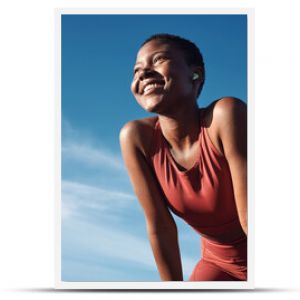 Fitness, black woman and happy athlete smile after running, exercise and marathon training workout. Blue sky, summer sports and run of a African runner breathing with happiness from sport outdoor