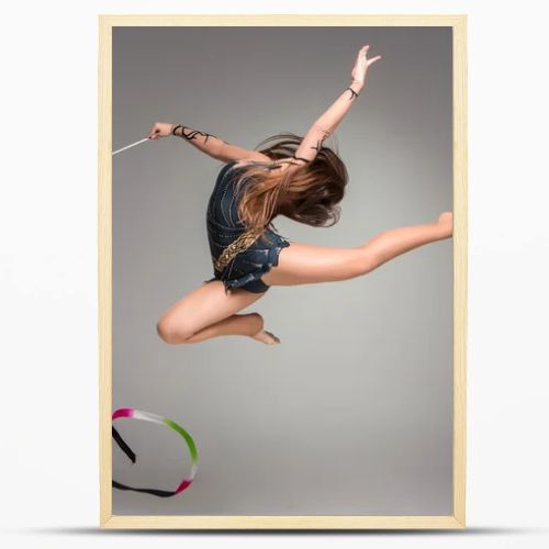 teenager doing gymnastics dance with ribbon