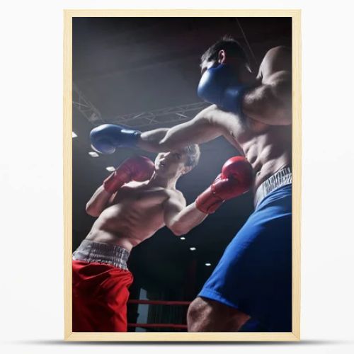 Fighting in boxing ring