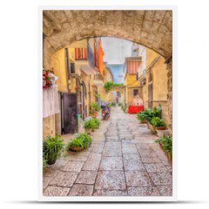 Alleyway in old white town Bari